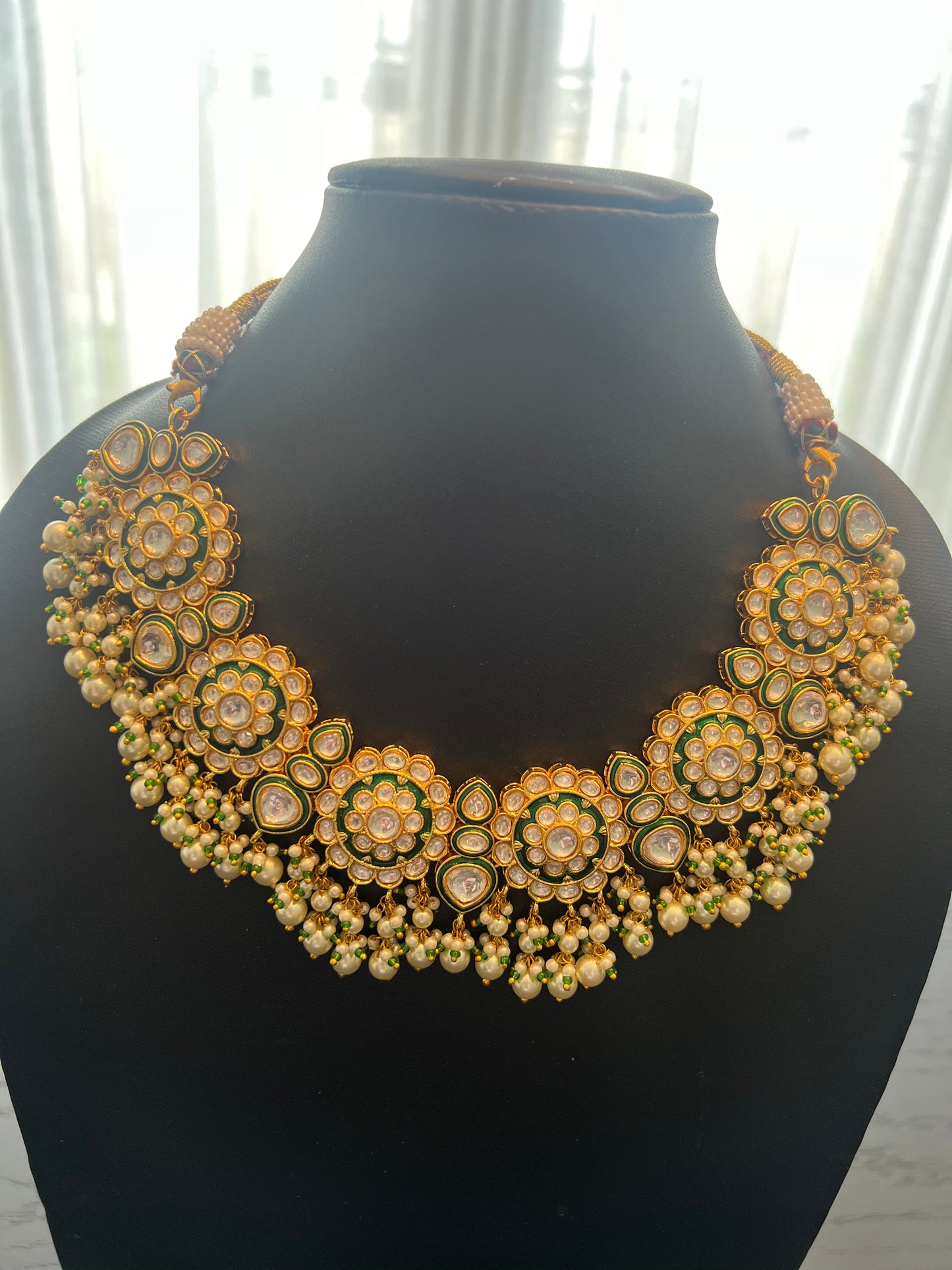 Golden and green kundan